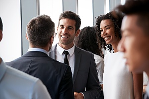 people networking in a business environment for careers in it
