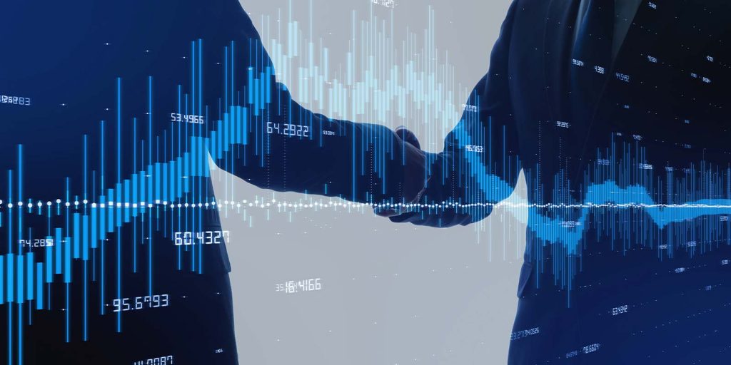 a businessman looking at charts and graphs